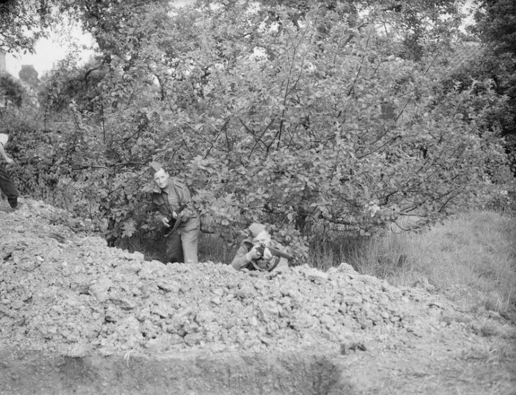 Two members of the Local Defence Volunteers (LDV) undertake rifle practice at Buckhurst Hill, Essex, 1 July 1940.