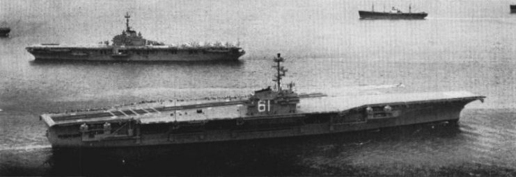 USS Ranger departing for sea trials in 1957