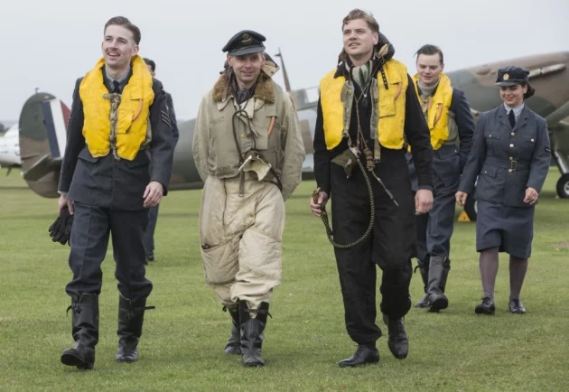 The Spirit of Britain living history group walk in the
footsteps of Battle of Britain pilots along the historic airfield at IWM
Duxford, 2018. Photo: IWM.