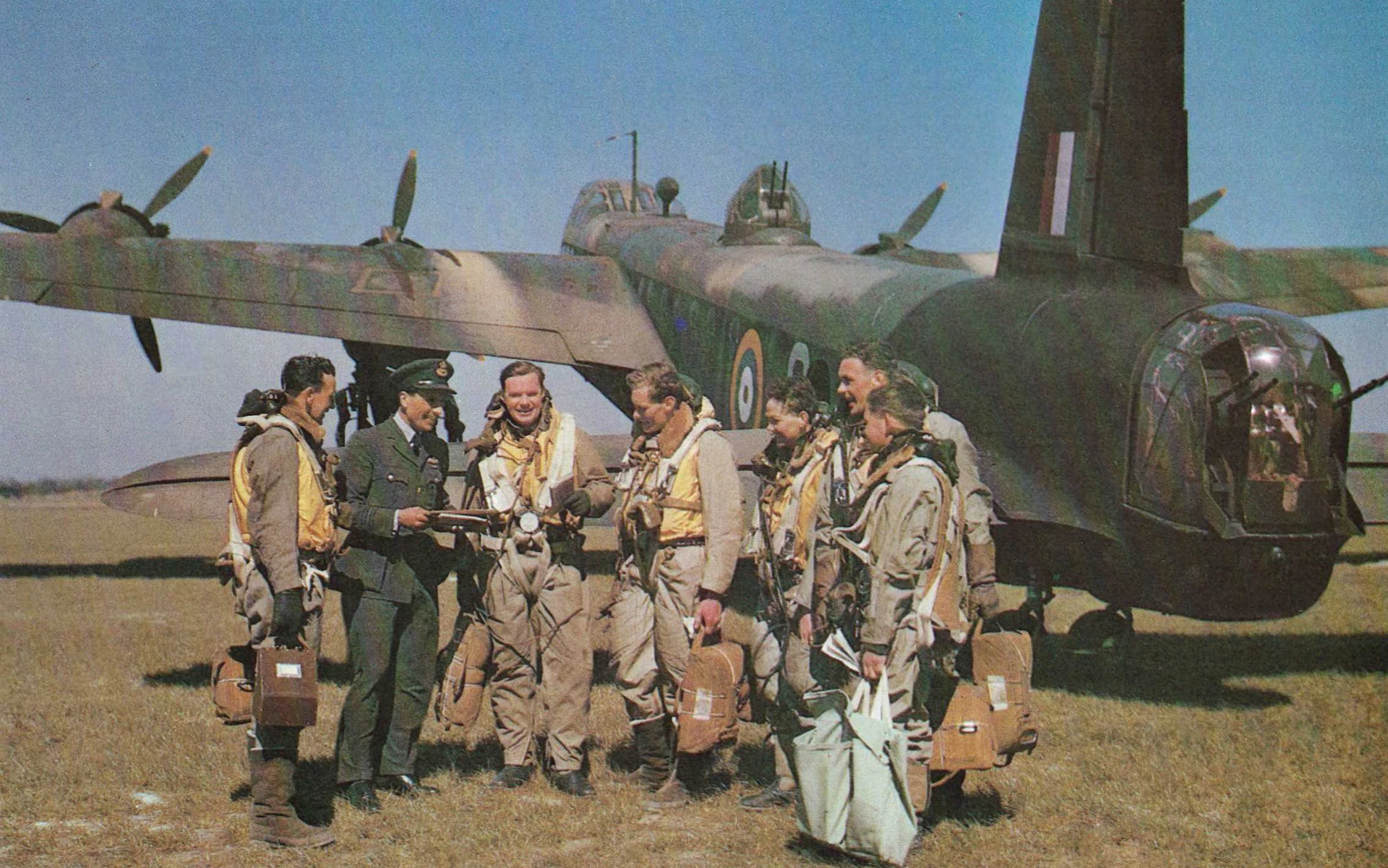 Captain Barr is third left. The RAF bomber crew being briefed in Cambridgeshire just weeks before their fateful mission in 1942. 
