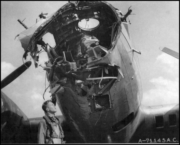 A serious head-on hit from Flak, that tore the nose turret apart. The resulting drag must have been immense, like opening a front shield in your old Jeep while riding downhill at 200 mph!