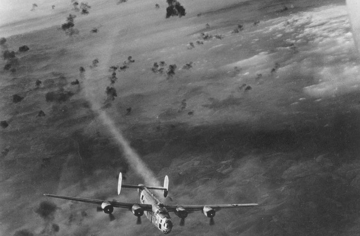 A dramatic picture of a B-24 Liberator, just hit by Flak in its nr. 2 engine. You can see where the smoke trail started, maybe only 10 seconds earlier, it was hit by shrapnel from an exploding shell. Is the Bomber losing altitude and breaking out of formation? With no other Bombers in view, you may figure so.If you have any clue how this ended for the stricken B-24, please let us know.