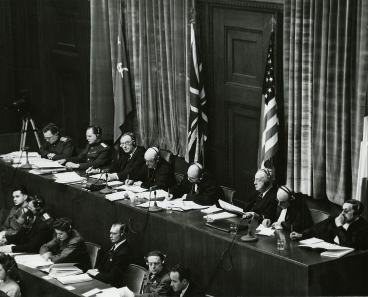 Judges sitting in Nuremberg, from left to right: Volchkov, Nikitchenko, Birkett, Sir Geoffrey Lawrence, Biddle, Parker, Donnedieu de Vabres and Falco