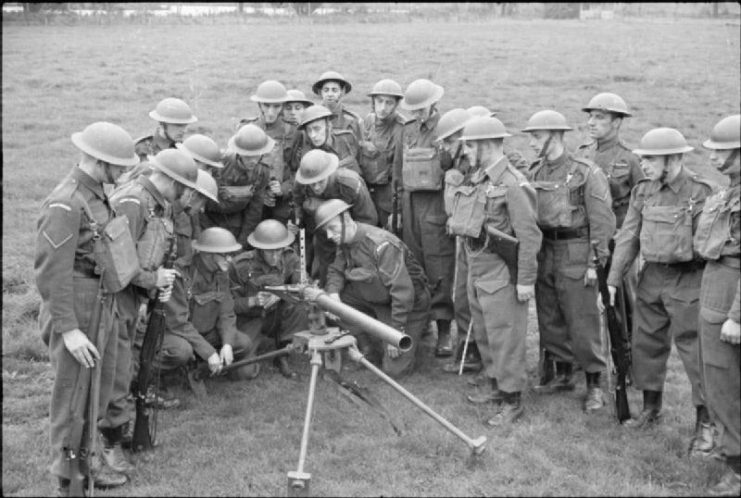 A group of Home Guard are trained in the use of a Northover Projector near the factory at which they work, somewhere in England, 1941.