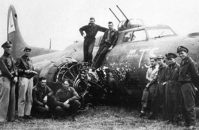 B-17 damaged in collision with Fw190 in head-on attack