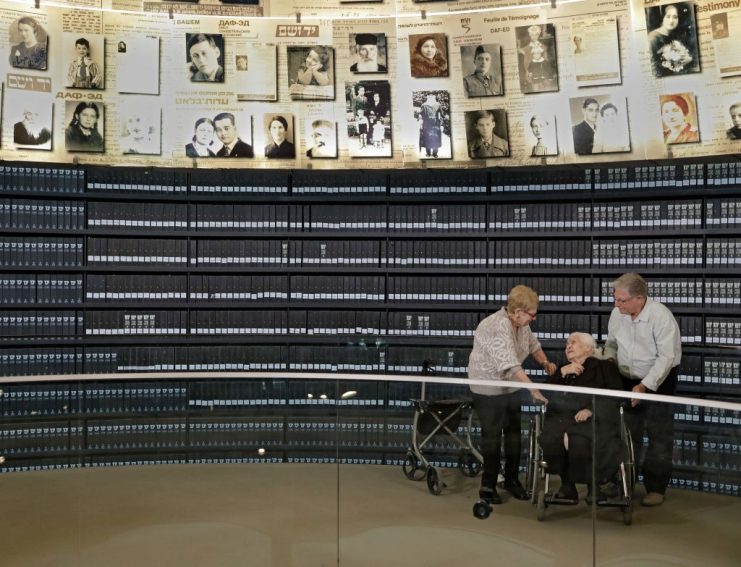 Melpomeni Dina talks with holocaust survivors . GETTY