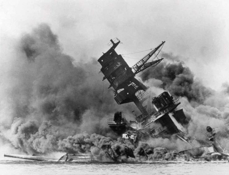 Smoke billows from a doomed USS Arizona after being bombed Dec. 7, 1941