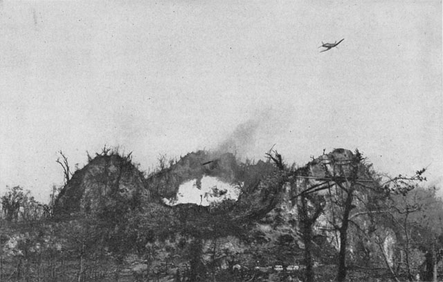A Corsair drops napalm on Japanese positions atop Umurbrogol.