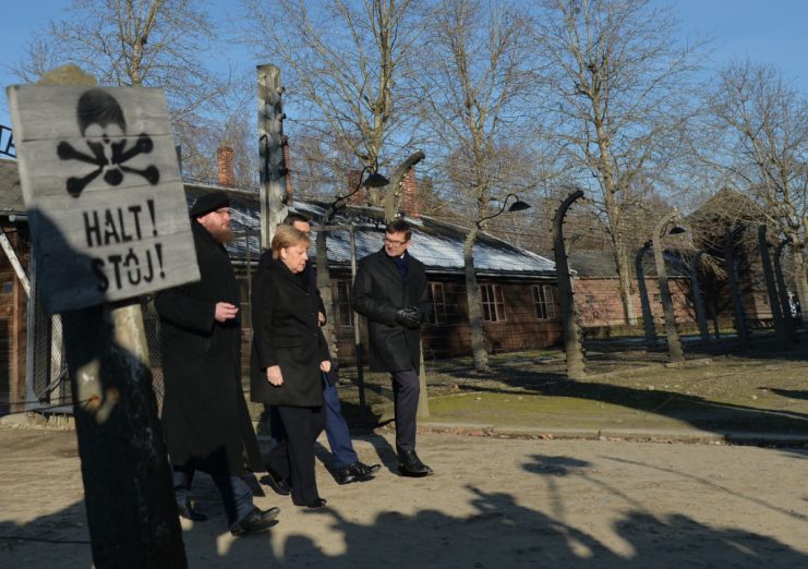 (L-R) Piotr Cywinski , Auschwitz Museum director, Angela Merkel, Chancellor of Germany, Mateusz Morawiecki, Prime Minister of Poland, Andrzej Kacorzyk, Museum deputy director