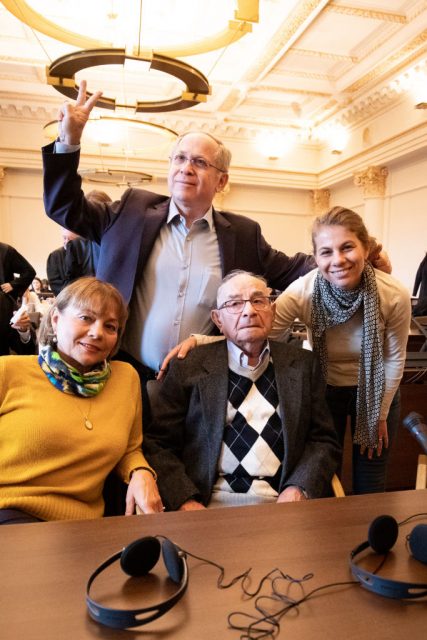 Holocaust survivor Abraham Koryski (C) from Israel, survivor of the Stutthof concentration camp, witness and joint plaintiff, poses with family members as he attends a session of a trial against former SS guard Bruno Dey. GETTY