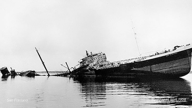 Photo above. In Balikpapan, Eastern Kalimantan (aka Borneo) was the largest oil refinery of Indonesia, owned by Shell/ BPM. On April 28, 1958, the Douglas A-26 flown by Beale made a surprise attack on the Harbor facilities of the Refinery. The British Tanker San Flaviano was hit and sunk. That was not a very smart idea and the Big Machine of political pressure on the CIA for stopping the Revolutionary “Wrecking Team” was about to be fired up.