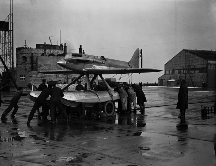 Flight Lieutenant Samuel Marcus Kinkead (1897 – 1928) stands on the right at Calshot Seaplane Station, while his Napier Supermarine S.5 undergoes a final engine test before his air speed record attempt, 12th March 1928. Kinkead died the same day, when the plane crashed into the sea. (Photo by H. F. Davis/Topical Press Agency/Hulton Archive/Getty Images)