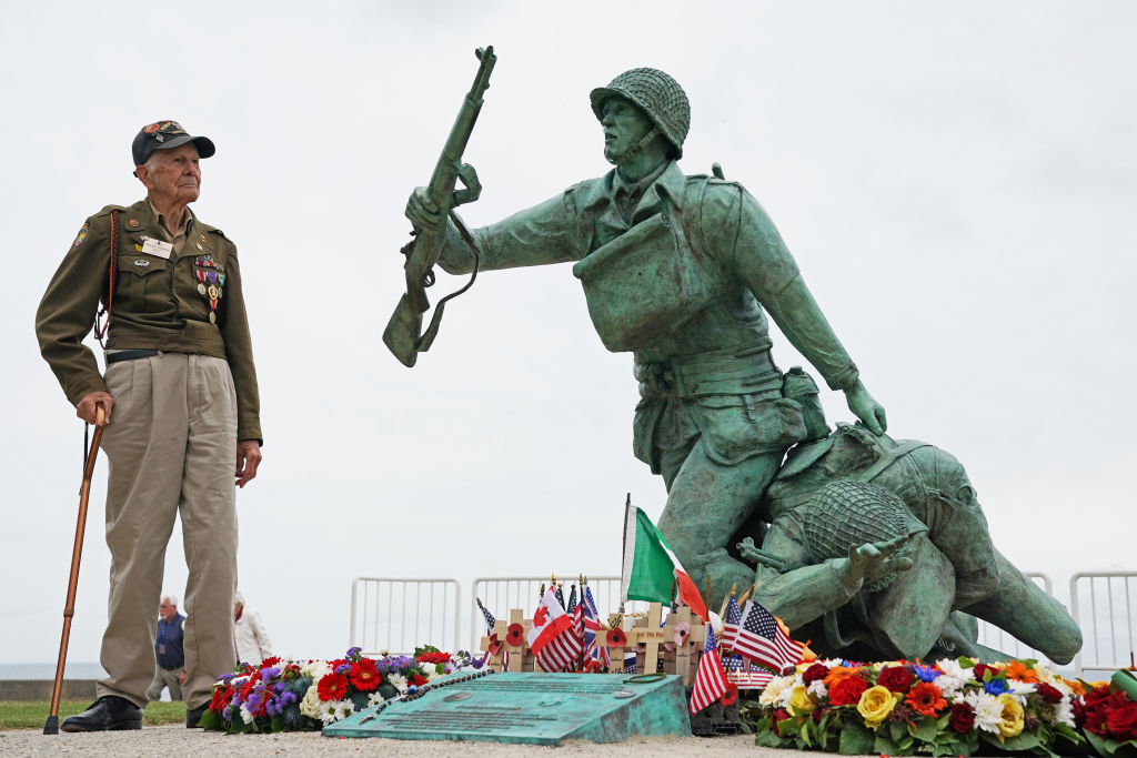 American veteran Harold Johnson, 97, from Hobart, Indiana, stands beside the 116th Regimental Combat Team Memorial at Omaha Beach during commemorations for the 75th anniversary of the D-Day landings. (Photo by Owen Humphreys/PA Images via Getty Images)