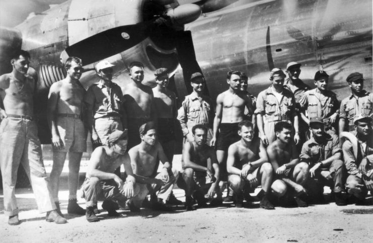 August 1945: The ground and flight crew of the B-29 bomber ‘Enola Gay’ at Tinian in the Mariana Islands, after the atomic bombing mission on Hiroshima. (Photo by MPI/Getty Images)