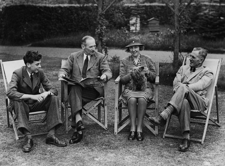 General Bernard Montgomery (second left), Commander of the Eighth Army, sitting outdoors with his son David and major and Mrs Reynolds, in the grounds of Amesbury School, Hinghead, July 13th 1943. (Photo by Reg Speller/Fox Photos/Getty Images)