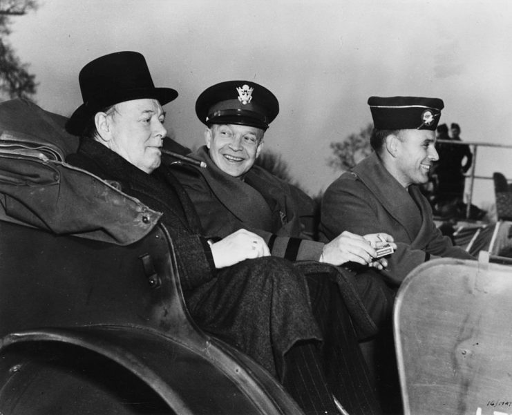 General Dwight Eisenhower (centre) talking to Prime Minister Winston Churchill (left) in the back of a car during World War Two, circa 1943. (Photo by Keystone/Hulton Archive/Getty Images)