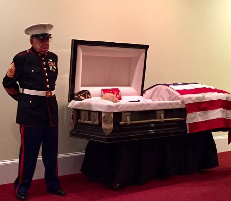 The then 83-year-old put on his dress blues and stood guard over his friend’s casket during his funeral service on October 20, 2017. A promise made in Vietnam. Credit: Bill Cox