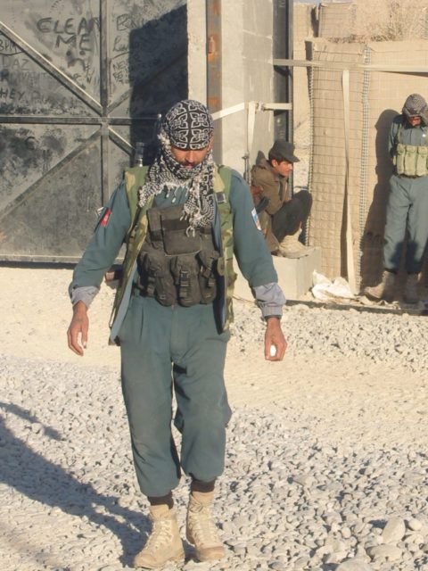 A member of the ANP, or Afghanistan National Police.