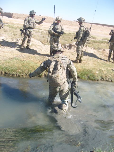Crossing a river with a GPMG.
