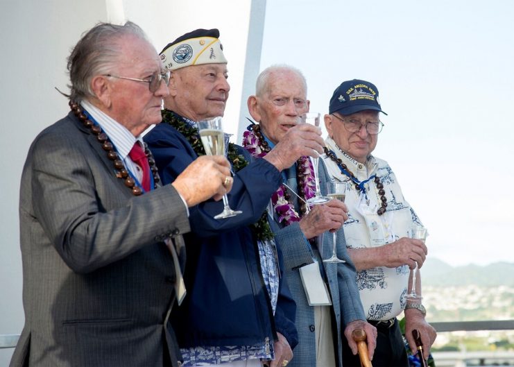On Dec. 7, 2014, four of the then-nine remaining survivors from the battleship USS Arizona came together in Hawaii. Donald Stratton, left, Louis Conter, John Anderson, and Lauren Bruner, toasted in honor of fallen shipmates and service members of the Dec. 7, 1941, Japanese attack at Joint Base Pearl Harbor-Hickam. Stratton died Saturday at his Colorado home. (Navy)