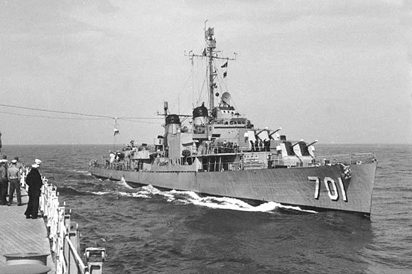 The U.S. Navy destroyer USS John W. Weeks (DD-701) during a highline transfer with the battleship USS Wisconsin (BB-64), in the 1950s. Korean War