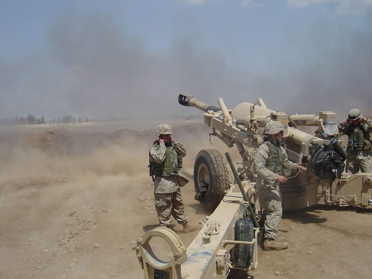 Marines from A/1/11 firing their M198 Howitzer