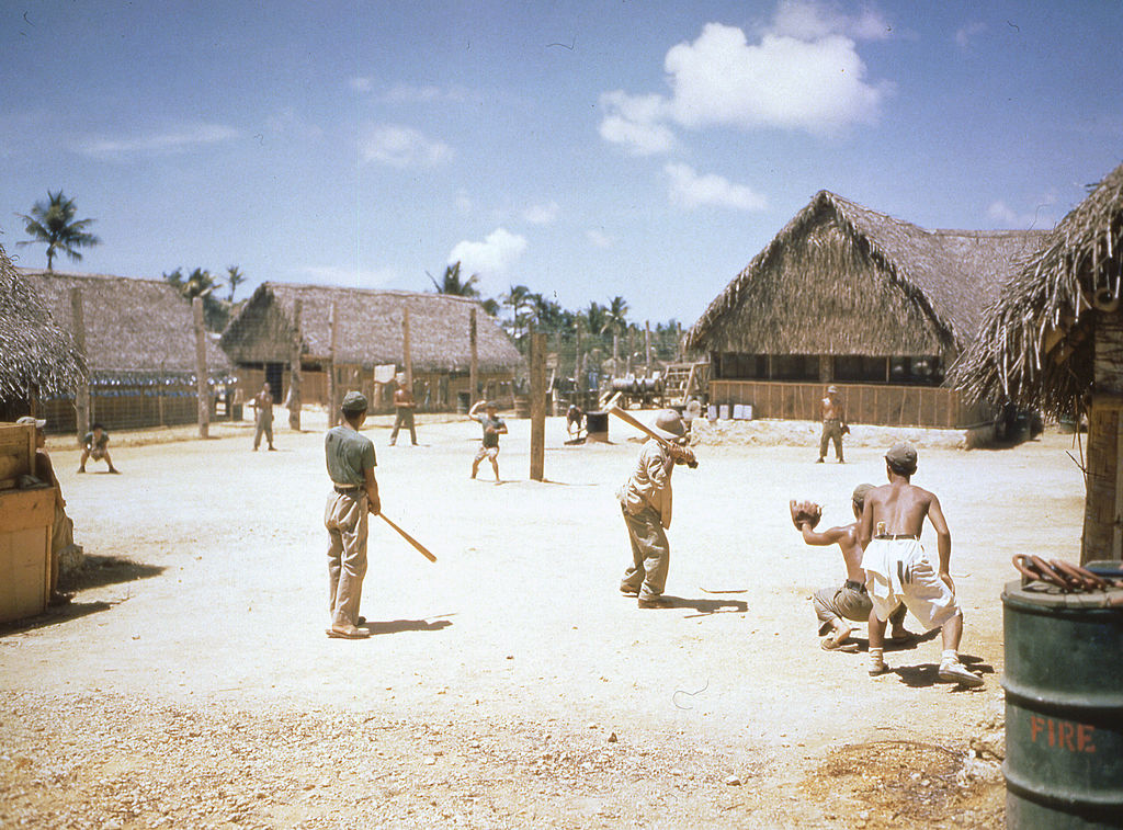 Japanese prisoners of war (POWs) playing baseball at a stockade, Guam, 1945. (Photo by PhotoQuest/Getty Images)