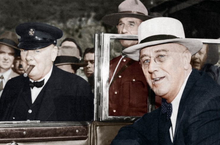 Franklin Delano Roosevelt (1882-1945), 32nd President of the USA (right) and Winston Churchill (1874-1965), British Prime Minister, meeting in Quebec in 1944. Churchill is smoking one of his trademark cigars. Churchill and Roosevelt had frequent summit meetings during the war to discuss strategy, usually at Churchill’s instigation. After the successful D-Day landings in Normandy in June 1944, the two leaders met in Quebec to agree their policy on the treatment of Germany after the war. (Colorised black and white print). (Photo by Print Collector/Getty Images)