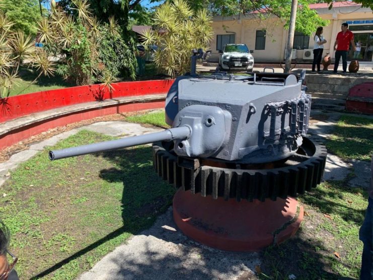 The M5A1  turret, which has been extracted by Bogo-Medellin Milling Company (Bomedco) in the 1980s, sits as a centerpiece of a mini-circular park at the Bomedco compound. 