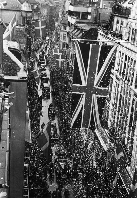 May 1945: Crowds turn out to welcome 1st Viscount Montgomery of Alamein (1887 – 1976), commander of the British Eighth Army in Africa, as his car passes through Stroget, a street in Copenhagen. (Photo by Keystone/Getty Images)