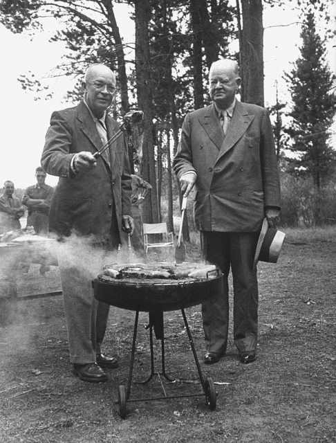 President Dwigth D. Eisenhower (L) cooking steaks with former President Herbert C. Hoover. (Photo by Walter Sanders/The LIFE Picture Collection via Getty Images)