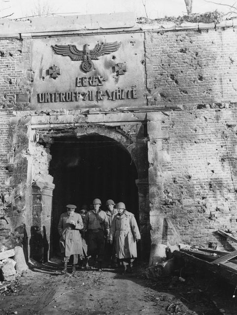 General Dwight Eisenhower and his party walking through the tunnel leading to the Citadel of Julich, with Generals Simpson and McLain, Germany, March 5th 1945. (Photo by Keystone/Hulton Archive/Getty Images)
