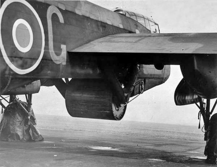 “Upkeep” bouncing bomb mounted under Gibson’s Lancaster B III (Special). Dam Busters