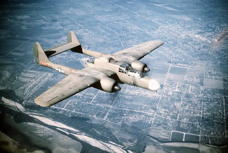 A P-61 Black Widow, similar to the one that distracted Japanese guards as American forces crawled towards the camp