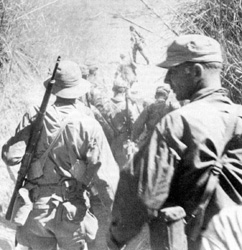 Army Rangers en route to liberate allied soldiers in the Cabanatuan POW camp.