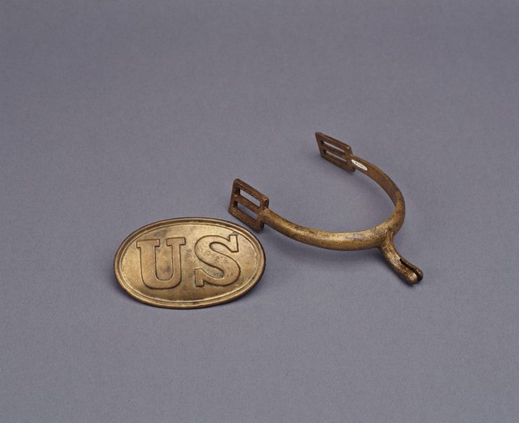 Military belt buckle and calvary spur