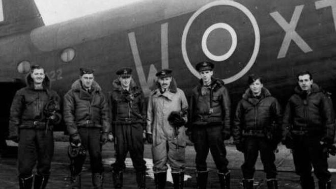 Captain Barr is third left. The RAF bomber crew being briefed in Cambridgeshire just weeks before their fateful mission in 1942.