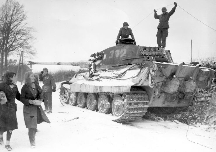 King Tiger, number 312, of the 3rd company 501 SS Schwere Panzer Abteilung and 82nd troopers. Corenne Belgium Bulge 1944