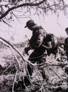 The idea isn’t new, this SEAL operator carries an M60E3 connected to an ammunition backpack.