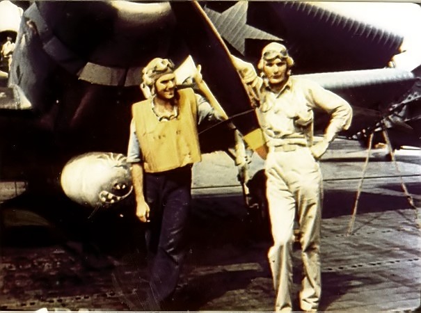 Ensign George Gay (right), sole survivor of VT-8’s TBD Devastator squadron, in front of his aircraft, 4 June 1942