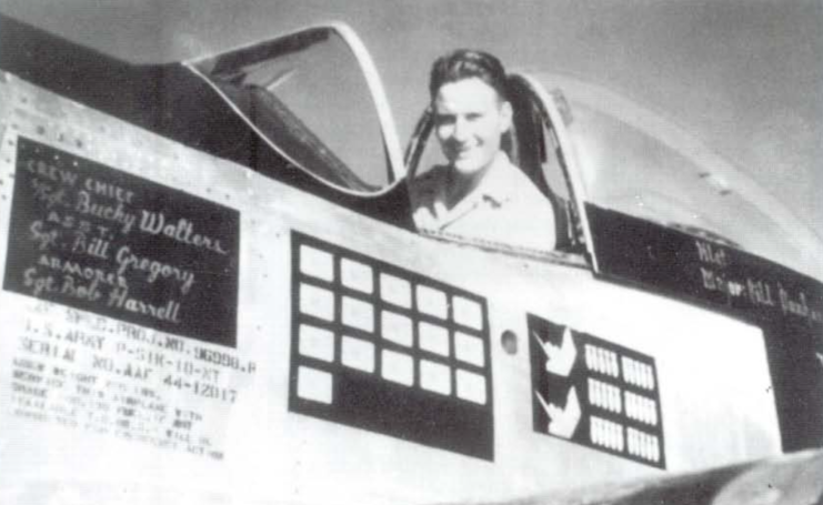 William Dunham sitting in the cockpit of a North American P-51K Mustang