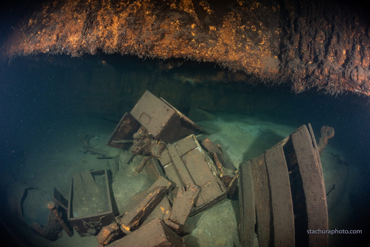 The wreck contains many crates, some opened, some still sealed. Could they contain parts of the Amber Room? Image by Baltictech