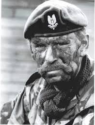 The legendary Ian Yule as the tough cockney “Tosh” in a still photo from the 1978 film “The Wild Geese”