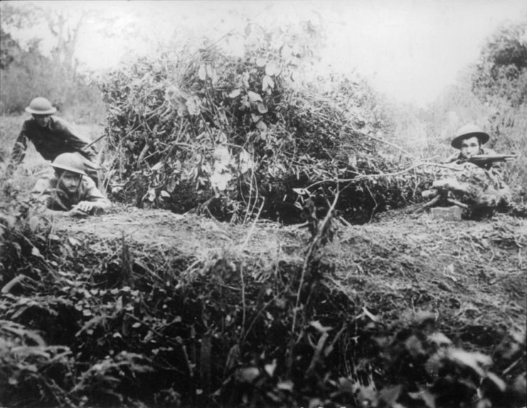 American and Filipino troops in action on Bataan, where Nininger earned the Medal of Honor.