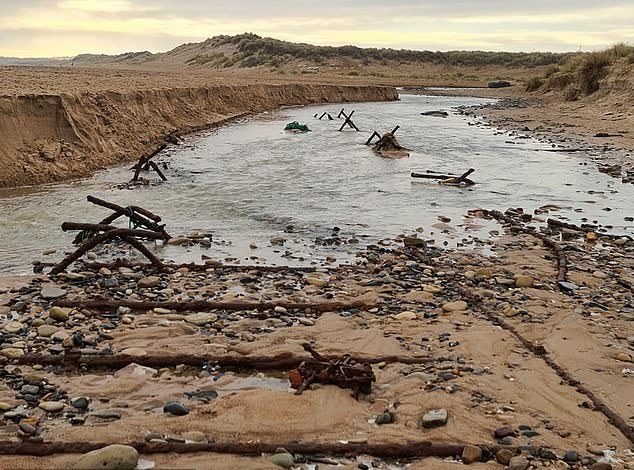 The defenses remain to this day, buried under the sand. Image by Keith Armstrong.