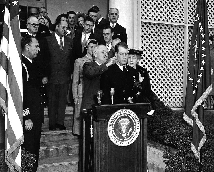 Hudner receives the Medal of Honor from President Harry S. Truman on 13 April 1951.