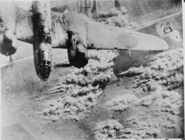 A Martin Baltimore of the Tactical Bomber Force of the North West African Air Forces, flying over its target by a road in Sicily, while bombing retreating German forces heading for Messina. August 1943. [© IWM (C 3772)]