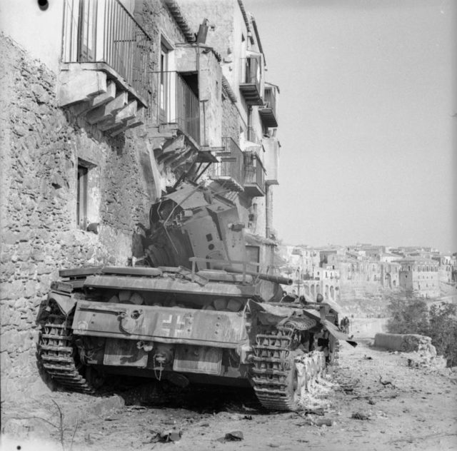 A German Mk III tank knocked out during the fierce street fighting in Centuripe. [© IWM (NA 5389)]