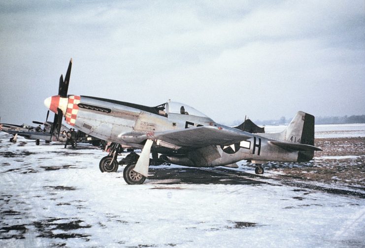 A P-51 Mustang (5Q-H, serial number 44-14070) of the 339th Fighter Group in snow at Bassingbourn, January 1945.
