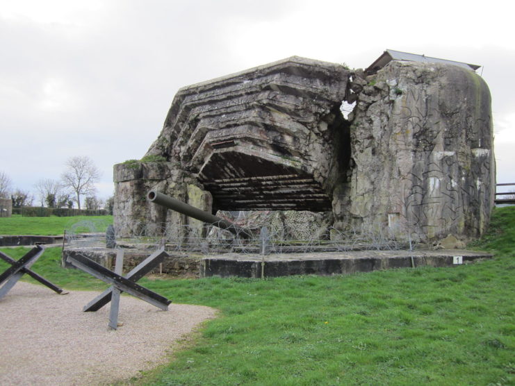 An enormous casemate at Crisbecq Battery, France. It was partially demolished by Allied forces in WW2 after its capture. Image credit – Xfigpower CC BY-SA 3..0